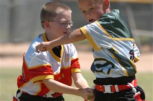 Young Boys Running with Football (Flag)